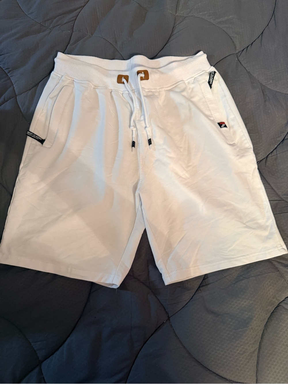 Vogue White Men's Athletic Drawstring Shorts with Gold Eyelets